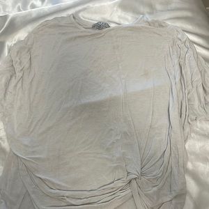 Plain white shirt with tie in the front